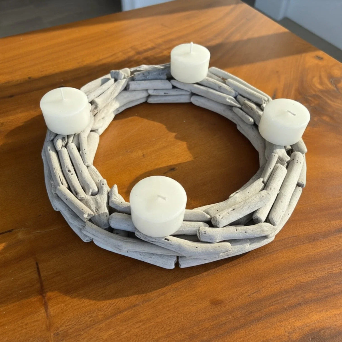 Round Driftwood Wreath Candle Holder Styled on a Wooden Table