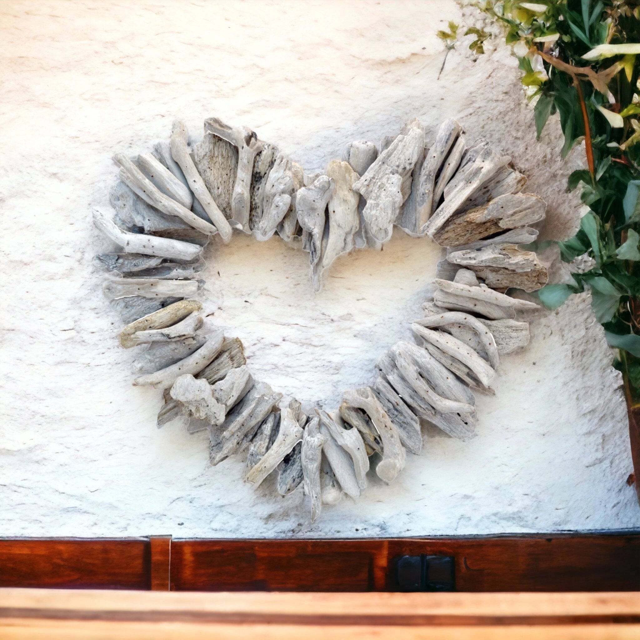 Transform your space with this unique Driftwood Heart Wall decor, bringing a coastal vibe to your home. Handmade