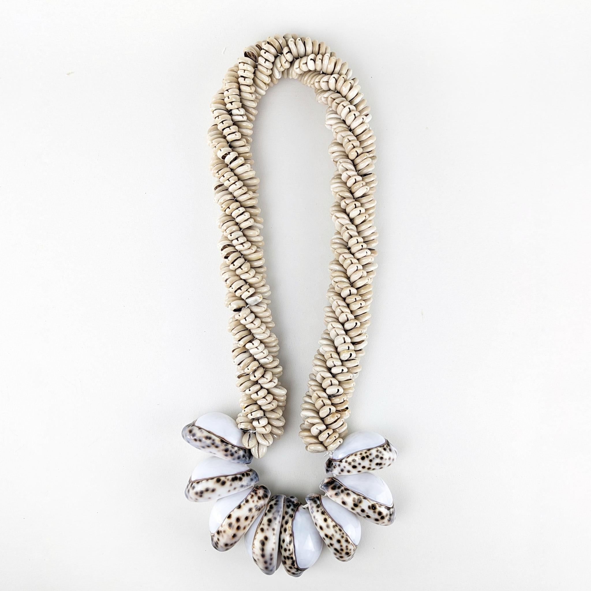 Natural Shell Wall Necklace featuring oversized tiger cowrie shells